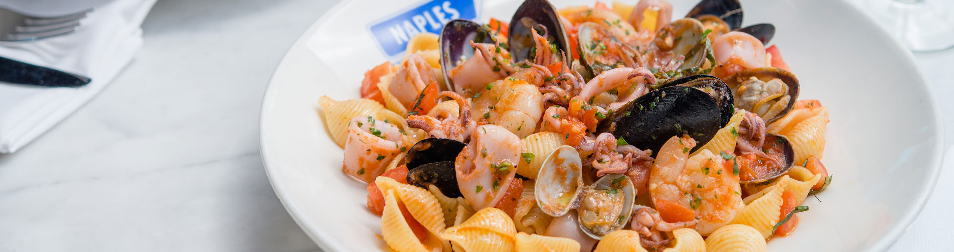 Seafood and pasta entree served at in Anaheim, CA at Naples Ristorante E Bar